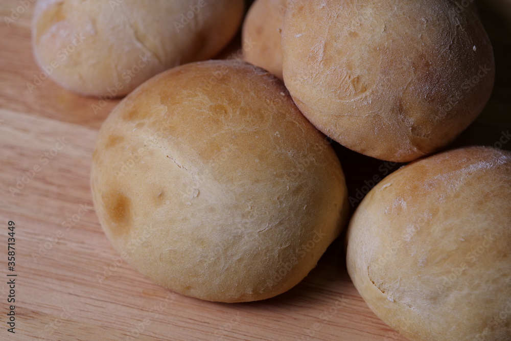 bread on a wooden table bread on a wooden table