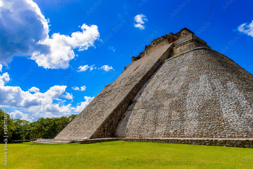 Pyramid of the Magician, a Mesoamerican step pyramid, Uxmal, an ancient Maya city of the classical period. UNESCO World Heritage site Pyramid of the Magician, a Mesoamerican step pyramid, Uxmal, an ancient Maya city of the classical period. UNESCO World Heritage site