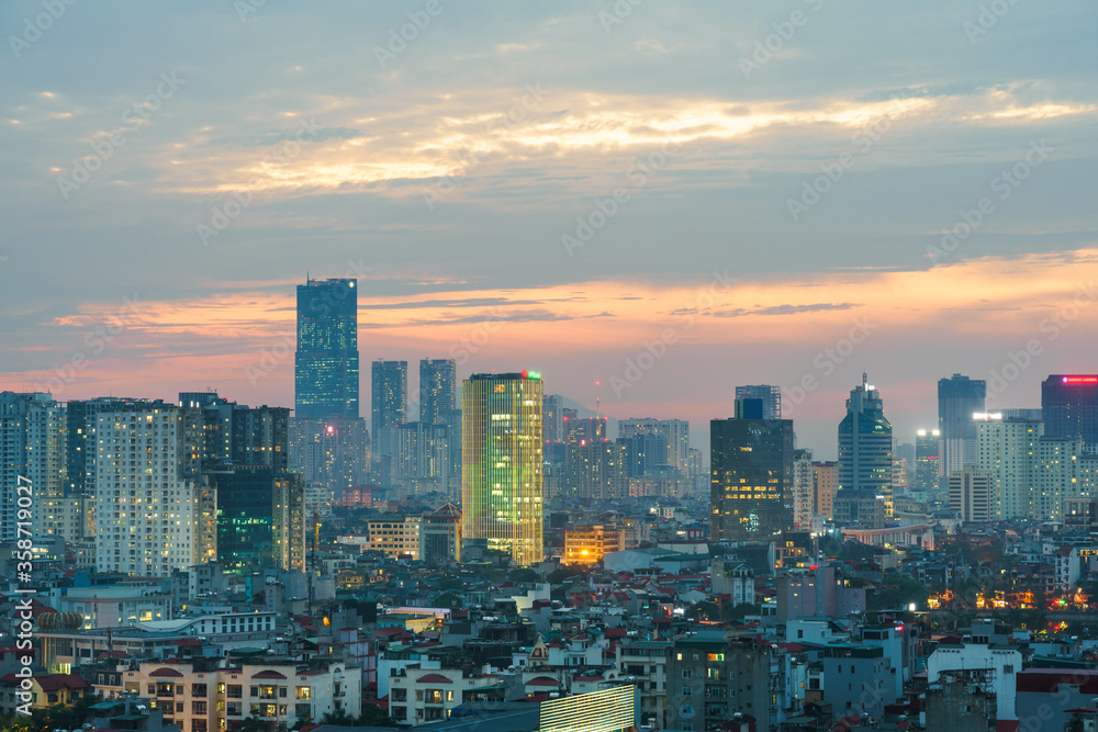 Hanoi cityscape at sunset with arising high buildings in Dong Da district