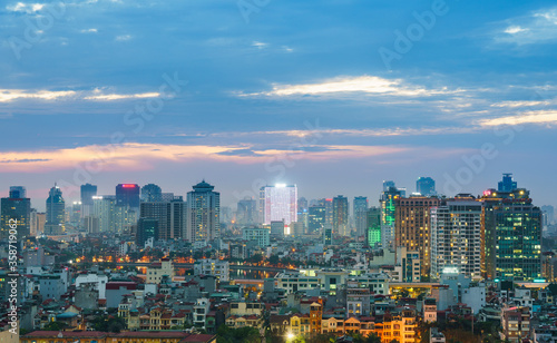 Hanoi cityscape at sunset with arising high buildings in Dong Da district