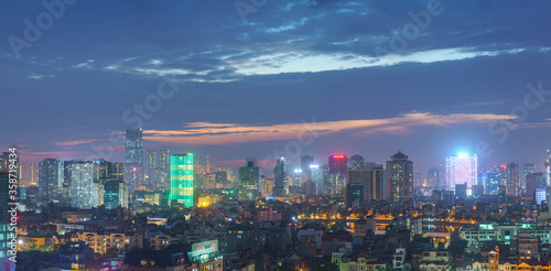 Hanoi cityscape at sunset with arising high buildings in Dong Da district