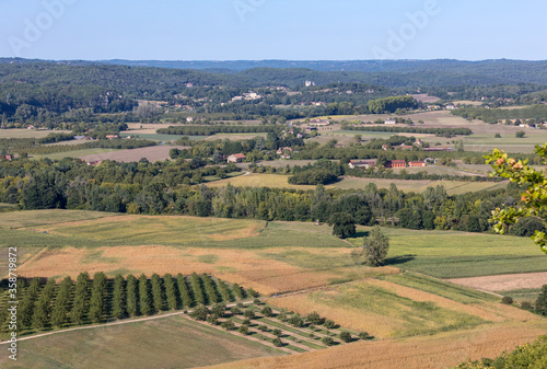 View of fields and meadows in the Dordogne Valley from the walls of the old town of Domme, Dordogne, France © wjarek