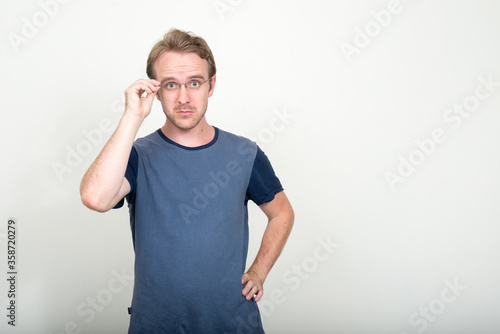 Portrait of handsome blond man with eyeglasses
