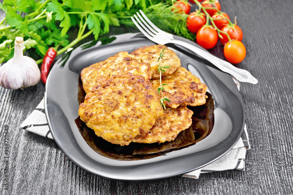 Fritters meat in plate on wooden board Fritters meat in plate on wooden board