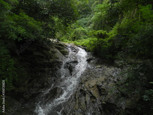 small waterfall in the forest © KARTHIK