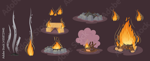 Firewood boards,bonfire of branches and logs, fire burning wooden logs, flaming and extinct fire bonfire and coals. Wood campfire.