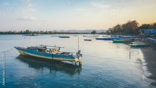 Wallpaper Mural Traditional Fishing Boat In Sumbawa, Indonesia. The boat is parking in the traditional port in fisherman Village. Torontodigital.ca