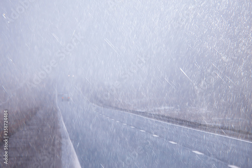 Schilderij op canvas autumn landscape highway rain and fog in europe, dangerous road, bad weather