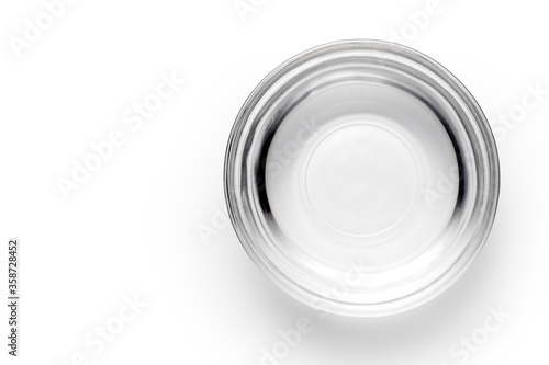 A bowl of water on white background, Top view.
