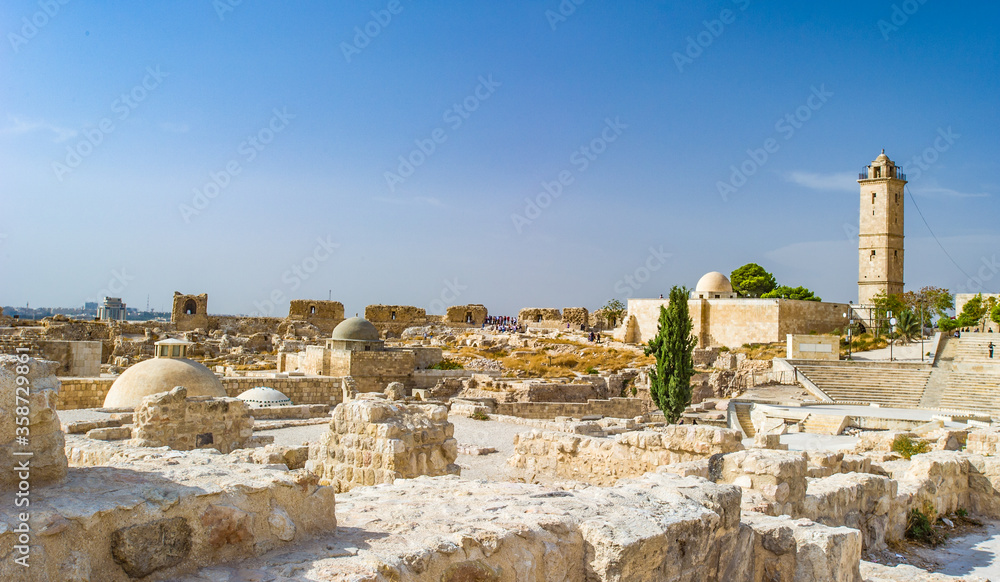 It's Ruins of Old Aleppo, Syria, one of the oldest continuously inhabited cities in the world; it has been inhabited since perhaps as early as the 6th millennium BC