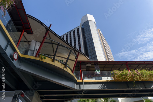 Kuala Lumpur, Federal Territory / Malaysia - February 15, 2017: Overhead pedestrian walking bridge adjacent to Sunway Putra Mall and Seri Pacific Hotel in early morning.