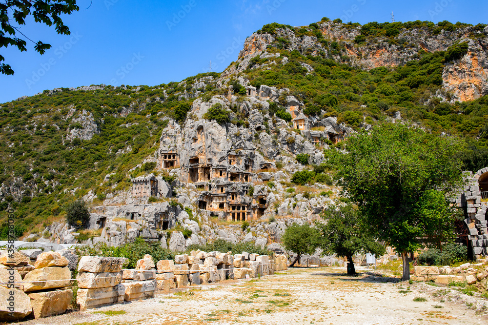 It's Ancient rock cut tombs of the Lycian necropolis, Myra, Turkey It's Ancient rock cut tombs of the Lycian necropolis, Myra, Turkey