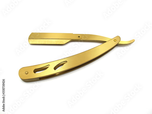Tableau sur toile Straight Razor gold color on white background