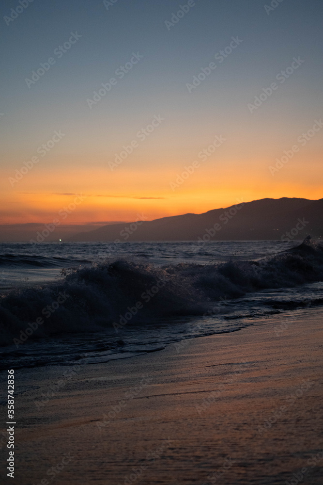 Malibu-sunset-beach-car-wave