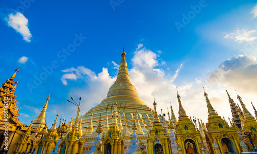 YANGON,MYANMAR-MAY 15.2020: Buddhist Pilgrims in the Shwedagon Pagoda at night. It is the most sacred Buddhist pagoda for the Burmese.