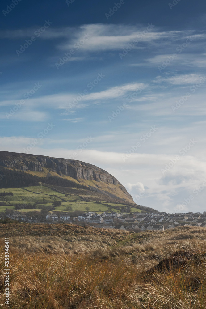 Strandhill town and Knocknarea hill in county Sligo, Ireland, Warm sunny day, Blue cloudy sky, Nobody.