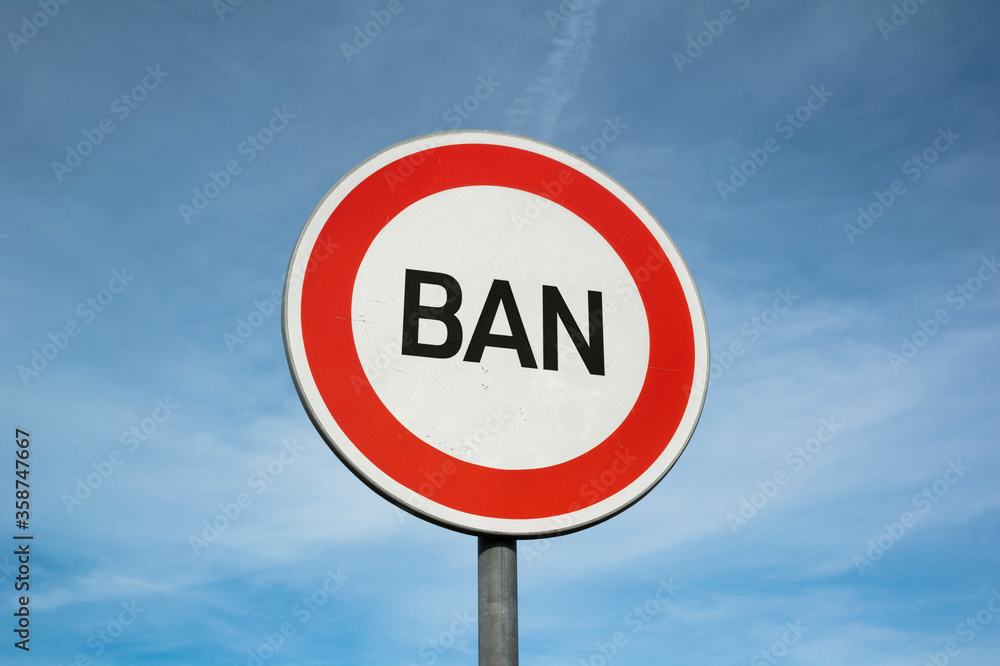 Ban and block - traffic sign and roadsign with text. Being banned, prohibited, disallowed, stopped and interdicted by prohibition and interdiction. Ban and block - traffic sign and roadsign with text. Being banned, prohibited, disallowed, stopped and interdicted by prohibition and interdiction.