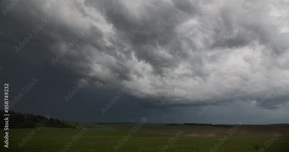 Storm Clouds In The Field Storm Clouds In The Field