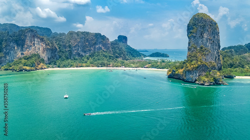 Railay beach in Thailand, Krabi province, aerial bird's view of tropical Railay and Pranang beaches with rocks and palm trees, coastline of Andaman sea from above
 photo