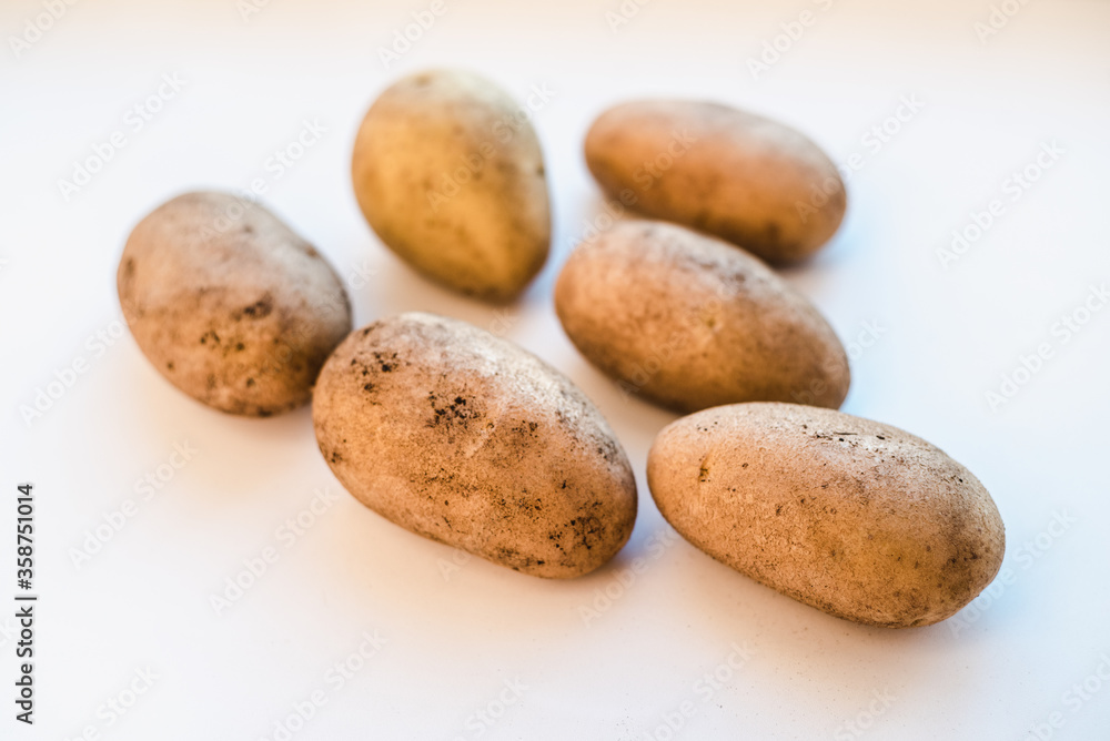 potatoes on white background, peeled potatoes on a white background potatoes on white background, peeled potatoes on a white background