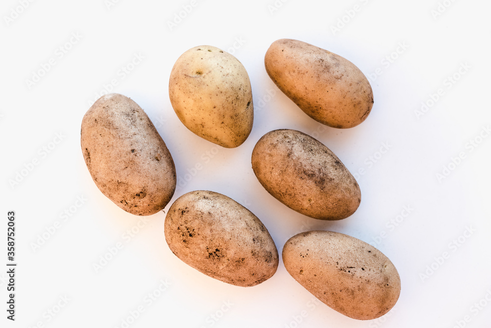 potatoes on a white background, new potatoes, a bunch of potatoes potatoes on a white background, new potatoes, a bunch of potatoes