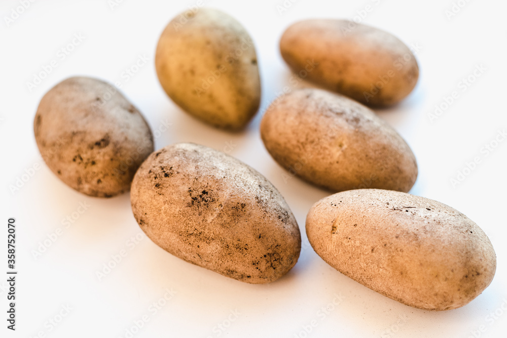 potatoes on a white background, new potatoes, a bunch of potatoes potatoes on a white background, new potatoes, a bunch of potatoes