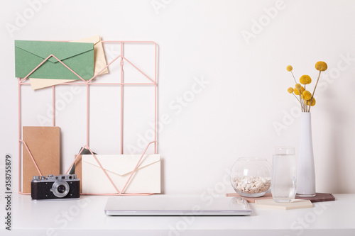 Home office desk interior. Stylish workplace mockup front view.