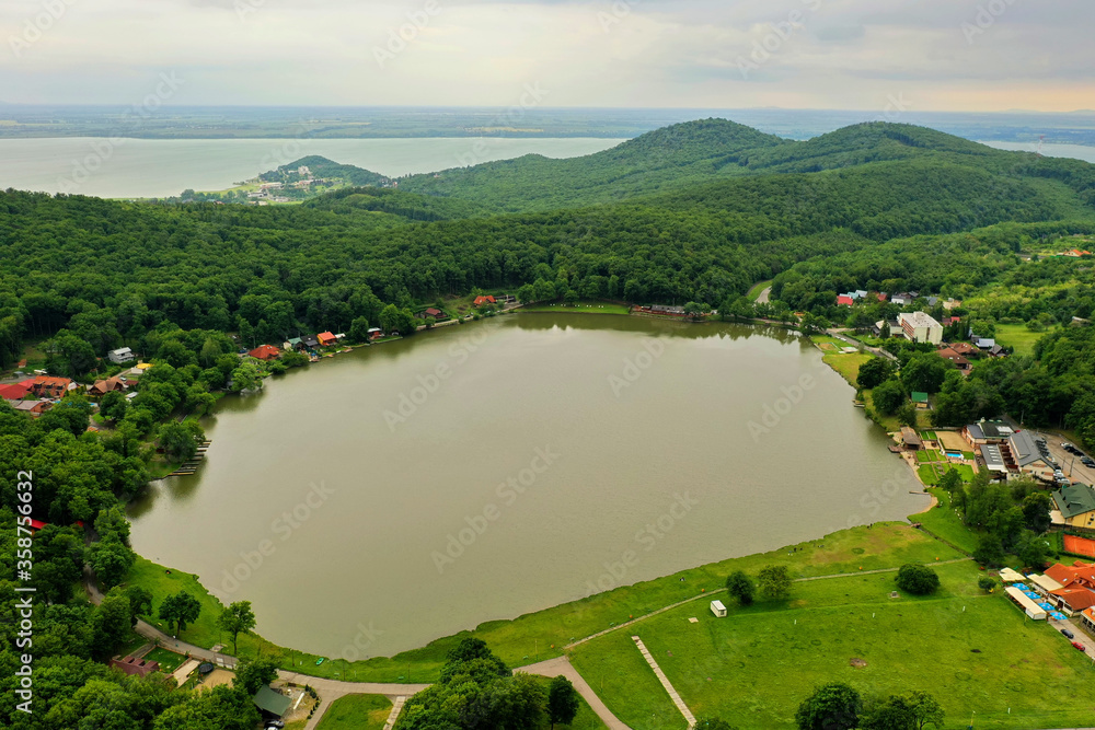 Fototapeta premium Aerial view of Lake Vinne in the village of Vinne in Slovakia