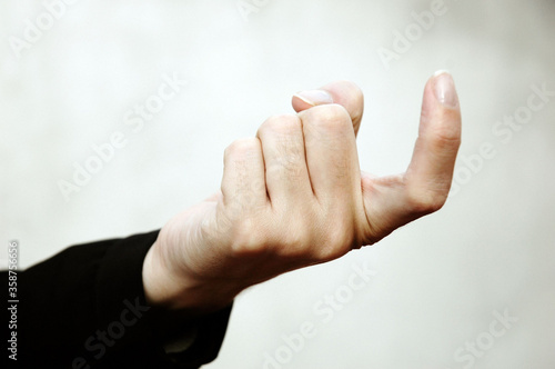 Hand Sign performing symbol language © Jopstock