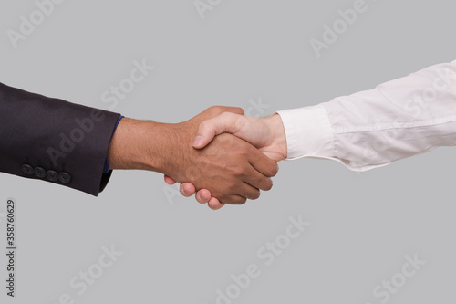 Hand Shake White and Black Businessmen. International Friendship hand shake. Black Lives Matter
