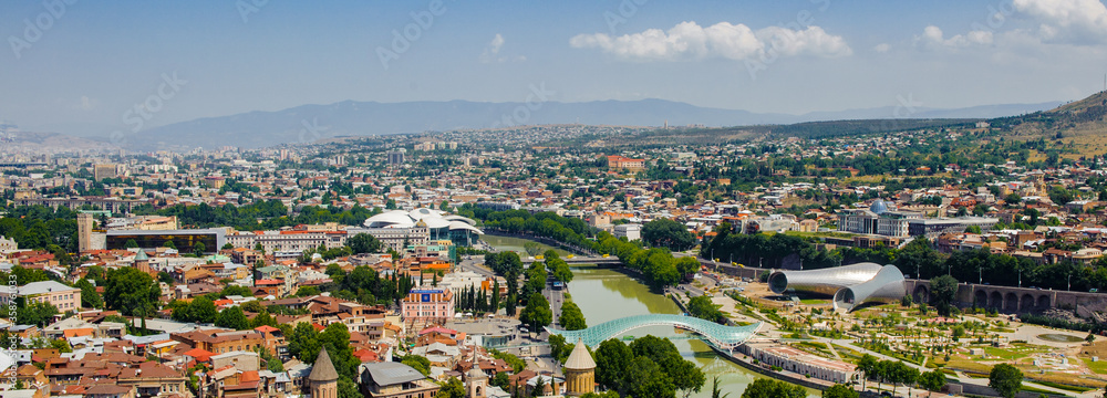 Naklejka It's Panoramic view of Tbilisi, Georgia. Tbilisi is the capital and the largest city of Geogia with 1,5 mln people population