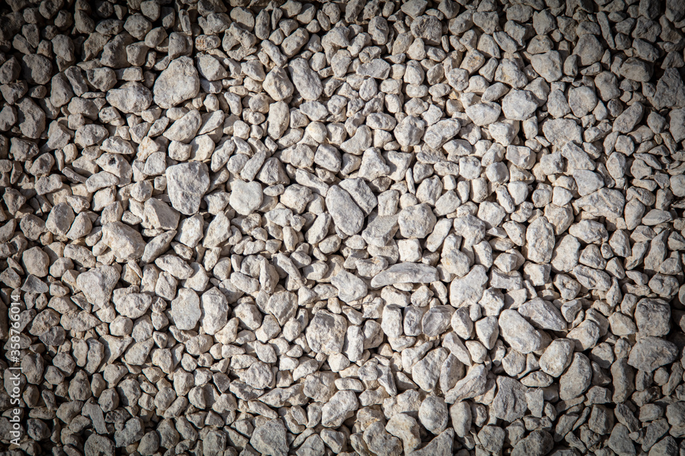 Stone gravel at a construction site as a background. Stone gravel at a construction site as a background.