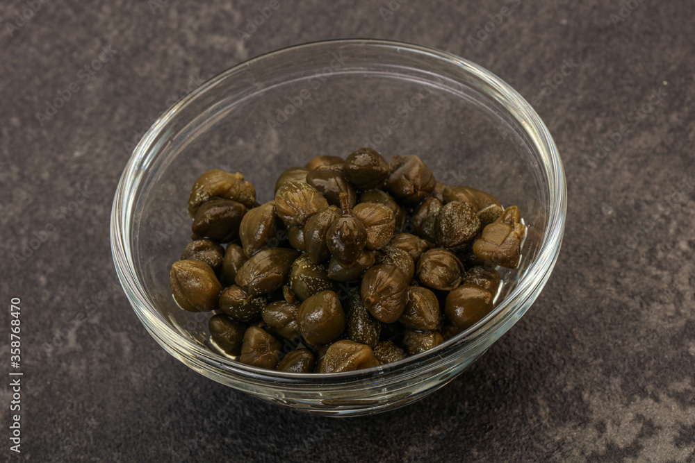 Tasty capers in the bowl Tasty capers in the bowl