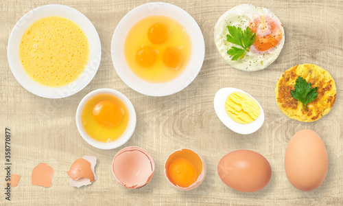Fried scrambled and boiled eggs on a wooden table background