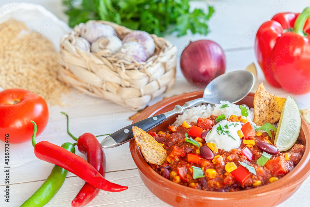 Vegan mexican chili based on soy granules with ingredients closeup Vegan mexican chili based on soy granules with ingredients closeup