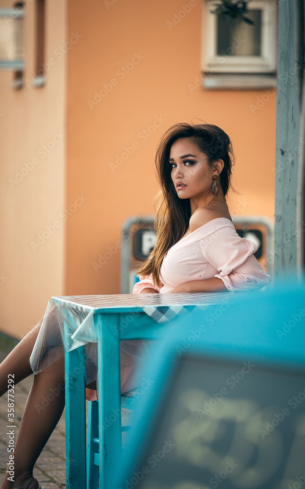 Beautiful girl wearing dress near the sea Beautiful girl wearing dress near the sea