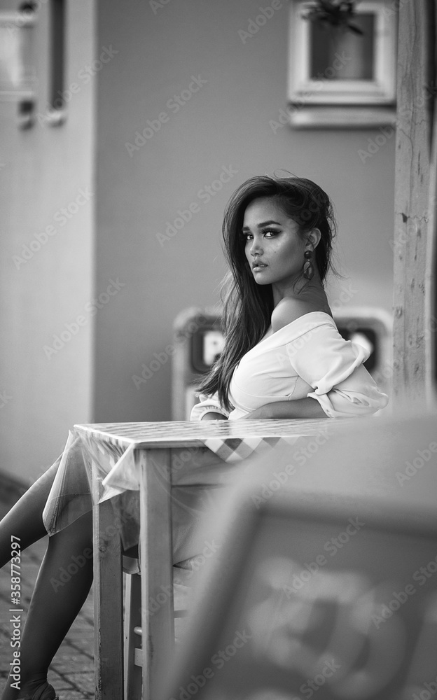 Beautiful girl wearing dress near the sea Beautiful girl wearing dress near the sea