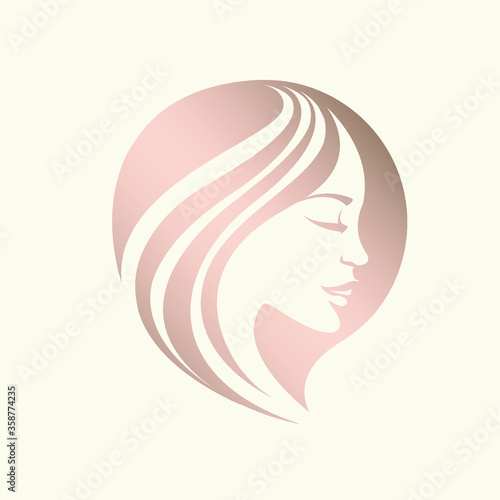 Hair salon and beauty studio logo.Beautiful woman portrait.Elegant hairstyle and makeup.Profile view face.Rose gold color.