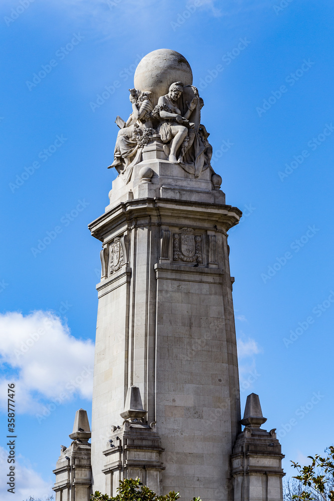 It's Miguel de Cervantes Saavedra monument on the Plaza de Espana, Madrid, Spain. Cervantes was a Spanish novelist, poet and playwright