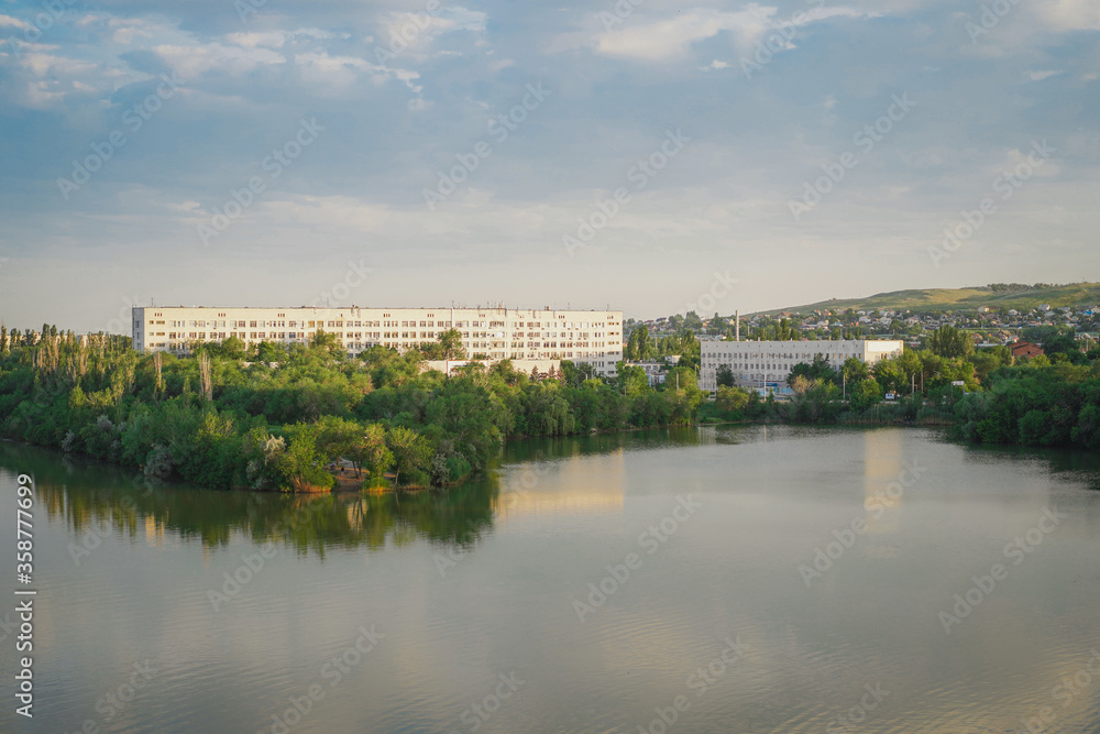 Peaceful panorama of the Russian city of Volgograd from the bridge, view of the mountains, high