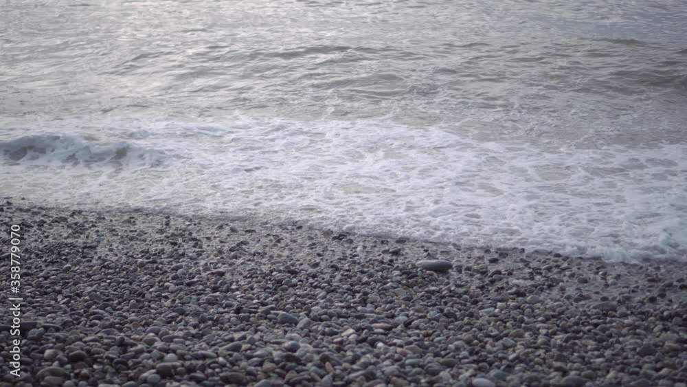 evening beach with sea waves evening beach with sea waves