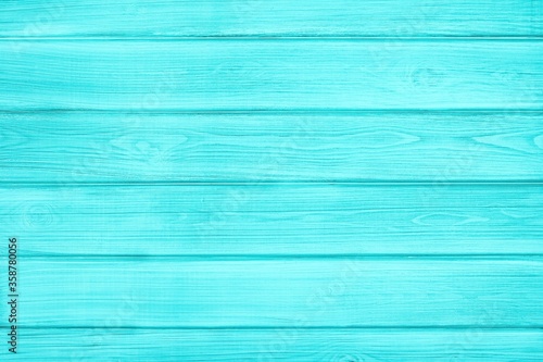 Turquoise painted wooden boards. Light teal pastel color wood texture. Shabby chic rustic vintage background