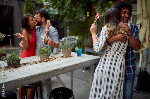 Young couples in lovely hug