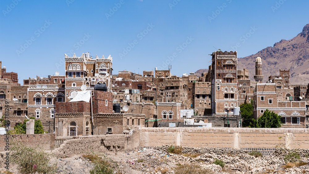 It's Architecture of Sana'a, the capital of Yemen.