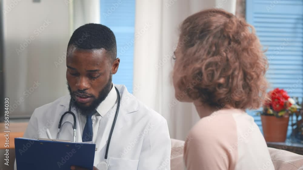 African doctor consult ill patient during home visit African doctor consult ill patient during home visit