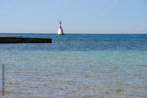 lighthouse on the coast © Qahri