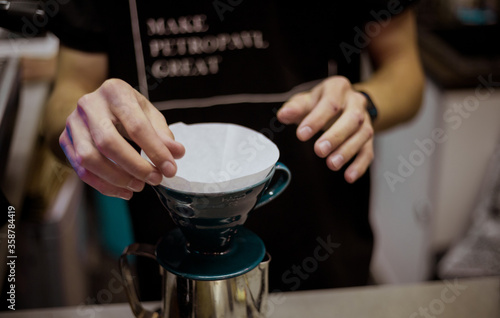 Barista preparing filter coffee, Close up