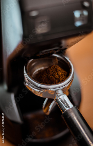 Coffee grinder soft focus and holder with coffee