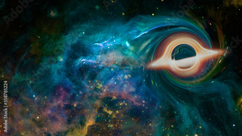 Supermassive black hole. Elements of this image furnished by NASA