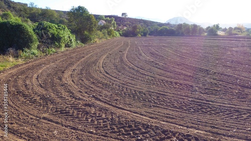 Tractor Tracks and Grooves in a Freshly Tilled Field of Dark Soil, Little Karoo South Africa